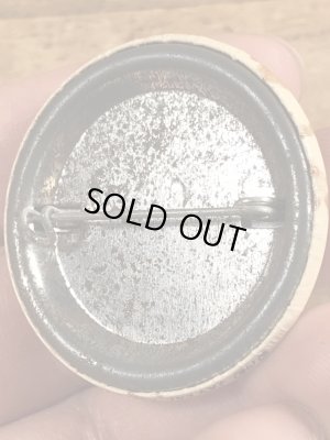 80年代頃のSit On A Happy Faceのメッセージが書かれたビンテージの缶バッジ