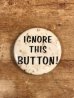 60年代頃のIgnore This Button!のメッセージが書かれたビンテージの缶バッチ