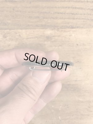 90’sのIt's Not The Same Old Thingのメッセージが書かれたビンテージの缶バッジ