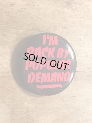 80年代頃のI'm Back By Popular Demandのメッセージが書かれたビンテージの缶バッジ