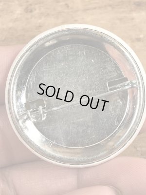 80'sのOutrageously Buns Bodaciousのメッセージが書かれたビンテージの缶バッジ