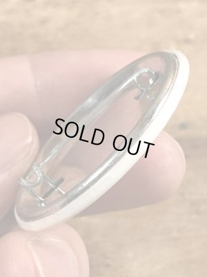 80'sのOutrageously Buns Bodaciousのメッセージが書かれたビンテージの缶バッジ