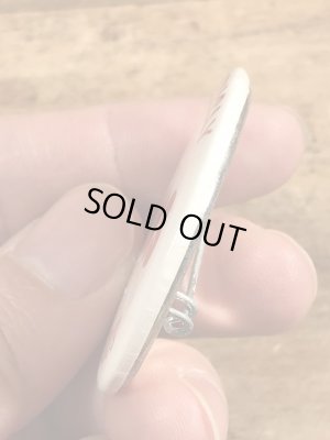 80年代頃のOutrageously Buns Bodaciousのメッセージが書かれたヴィンテージの缶バッチ