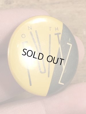 80年代頃のOn The Fritzのメッセージが書かれたヴィンテージの缶バッチ