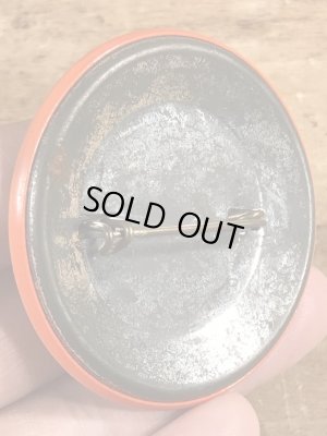 70'sのメッセージが書かれたビンテージの缶バッジ