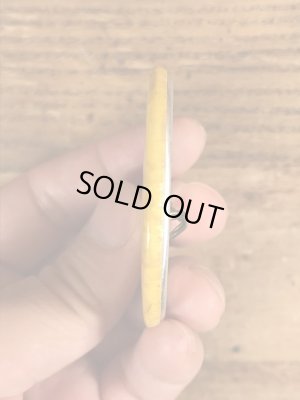 70年代頃のメッセージが書かれたビンテージの缶バッジ