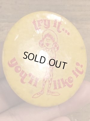 70年代頃のメッセージが書かれたビンテージの缶バッジ