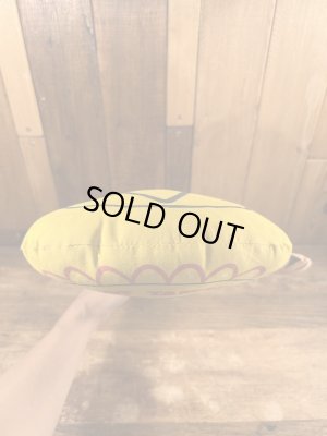 企業キャラクターのホットタマレキッドのぬいぐるみ