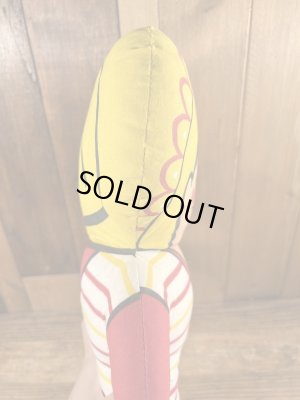 企業キャラクターのホットタマレキッドのぬいぐるみ