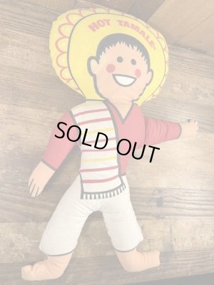 企業キャラクターのホットタマレキッドのぬいぐるみ