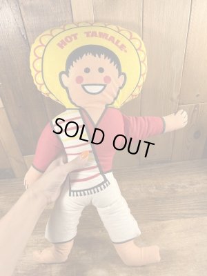 企業キャラクターのホットタマレキッドのぬいぐるみ