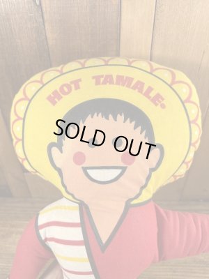 企業キャラクターのホットタマレキッドのぬいぐるみ