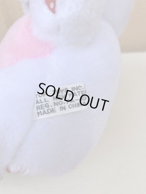 ドット柄のかわいいしろくまのぬいぐるみ