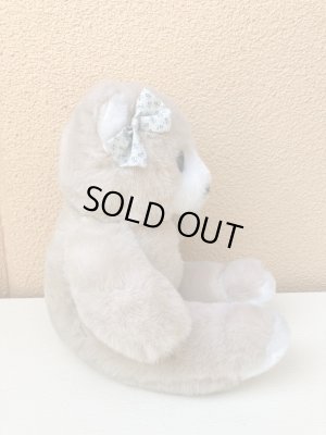 リボンを付けたビンテージのテディベア