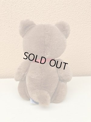 赤いリボンがかわいいビンテージのテディベア