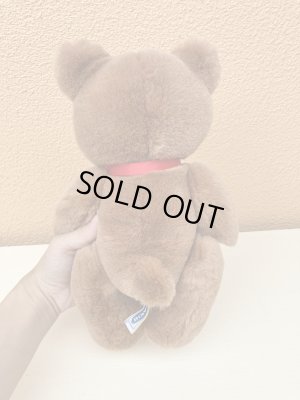 赤いリボンがかわいいビンテージのテディベア