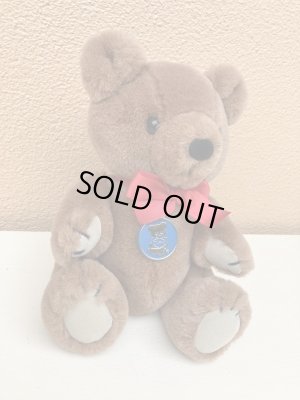 赤いリボンがかわいいビンテージのテディベア