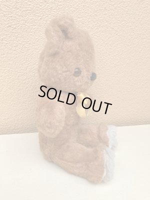 リボンの付いたビンテージのオールドテディベアのぬいぐるみ