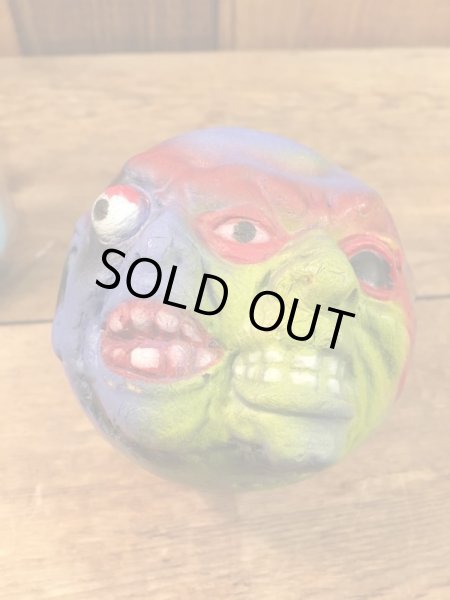 ビンテージのマッドボールバットとボールの袋入り