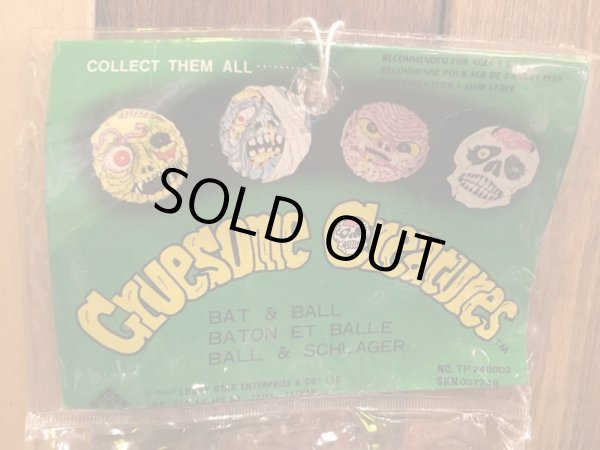 ビンテージのマッドボールバットとボールの袋入り