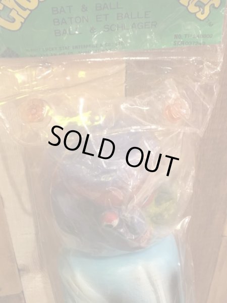 ビンテージのマッドボールバットとボールの袋入り