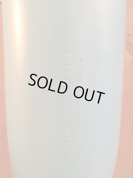 ビンテージのマッドボールバットとボールの袋入り