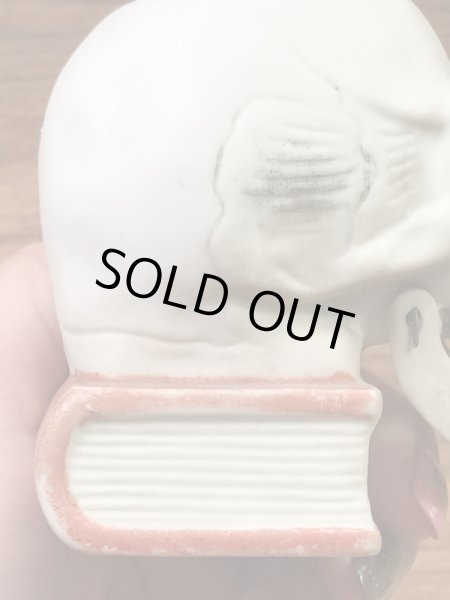 顎がゆらゆら揺れるスカルオンブックの50’sヴィンテージマッチホルダー