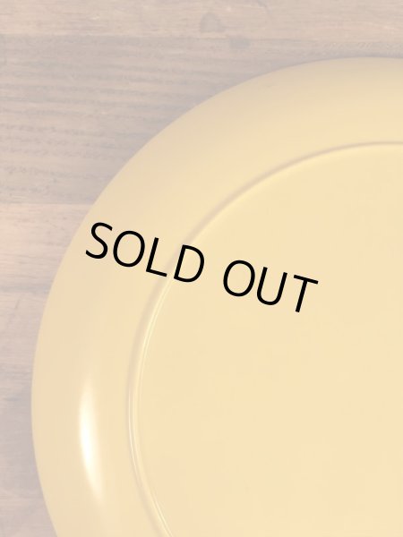 スマイルのプラスチック製の70年代ビンテージお皿