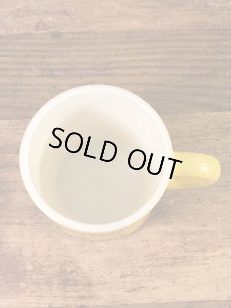 スマイルのミルクガラス製の70年代ビンテージマグカップ