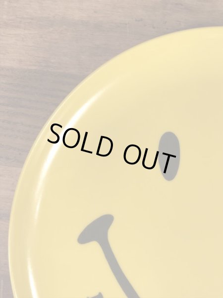 スマイルフェイスと“I Ate The Whole Thing!”のメッセージが書かれた70’sヴィンテージプラスチックプレート