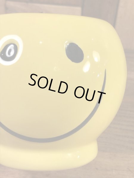 スマイルフェイスのセラミック製の90’s〜ヴィンテージマグ