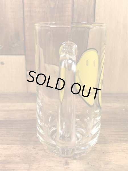 スマイルフェイスが描かれたガラス製の70’sヴィンテージジョッキグラス