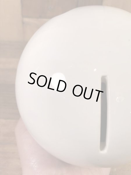 スマイルの陶器製の70年代ビンテージ貯金箱