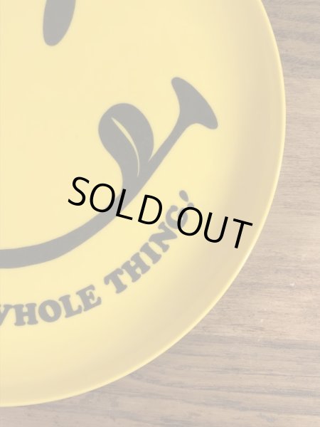 スマイルのプラスチック製の70年代ビンテージお皿