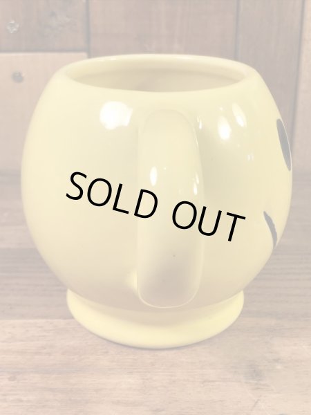 スマイルフェイスのセラミック製の70’sヴィンテージマグカップ