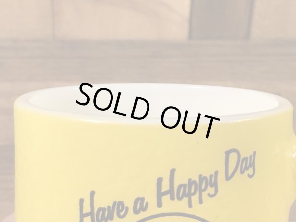 スマイルフェイスとHave A Happy Dayが描かれた70’sヴィンテージヘーゼルアトラスマグ