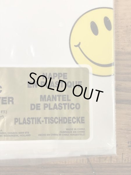スマイルフェイスのビニール製の80’s〜ヴィンテージテーブルカバー