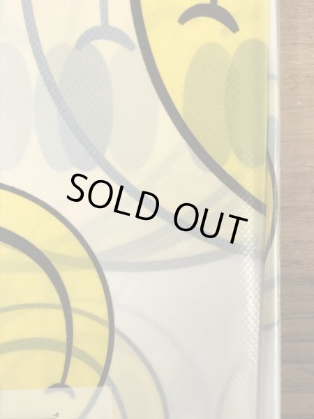 スマイルフェイスのビニール製の80’s〜ヴィンテージテーブルカバー