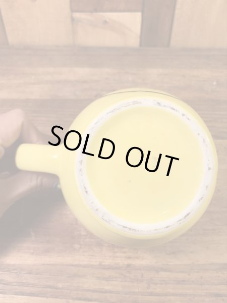 スマイルフェイスのセラミック製の70’sヴィンテージマグカップ