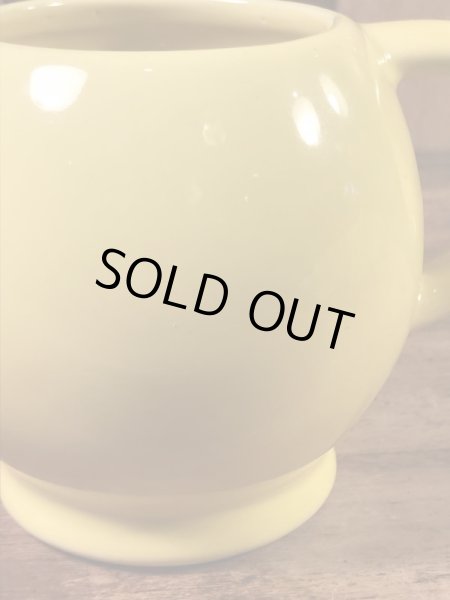 スマイルフェイスのセラミック製の70’sヴィンテージマグカップ