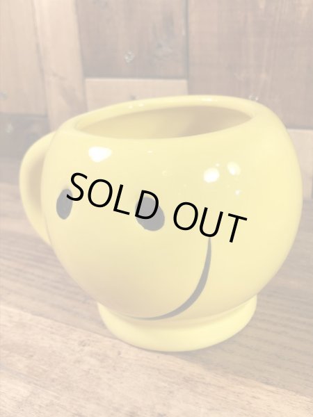 スマイルフェイスのセラミック製の90’s〜ヴィンテージマグ