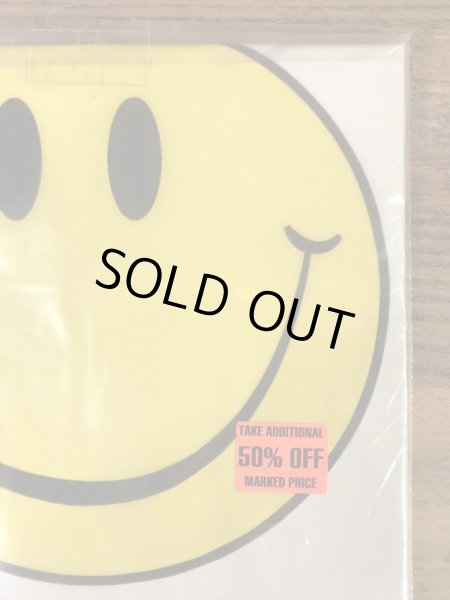 スマイルフェイスのビニール製の80’s〜ヴィンテージテーブルカバー