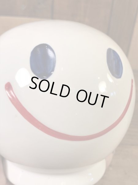 スマイルの陶器製の70年代ビンテージ貯金箱