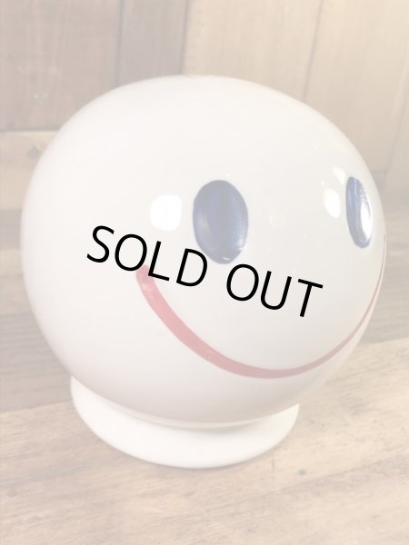 スマイルの陶器製の70年代ビンテージ貯金箱