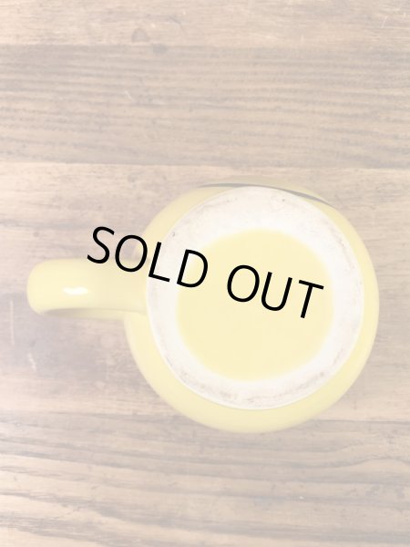 スマイルフェイスのセラミック製の90’s〜ヴィンテージマグ