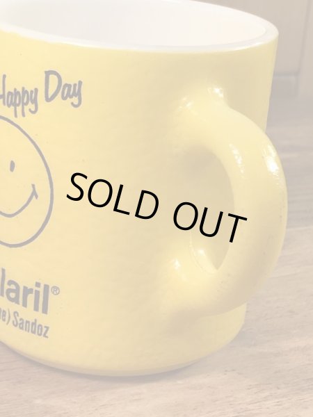 スマイルフェイスとHave A Happy Dayが描かれた70’sヴィンテージヘーゼルアトラスマグ