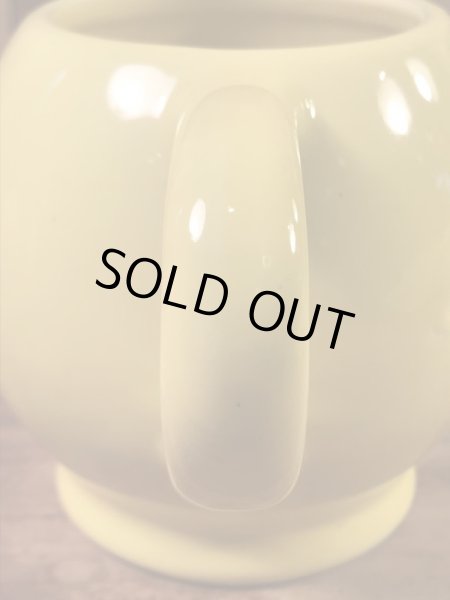 スマイルフェイスのセラミック製の70’sヴィンテージマグカップ