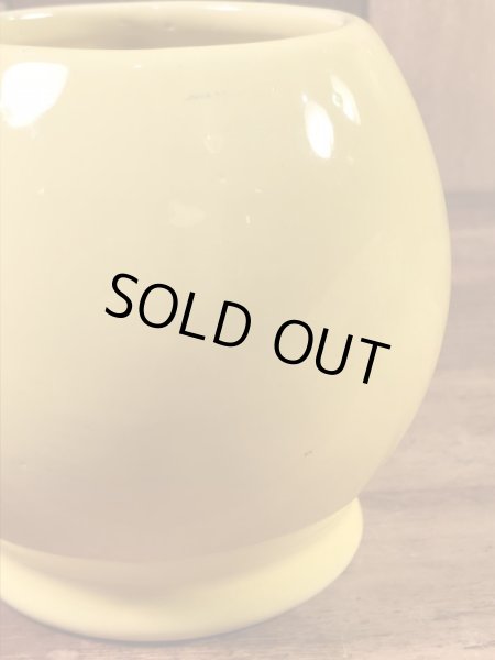 スマイルフェイスのセラミック製の70’sヴィンテージマグカップ