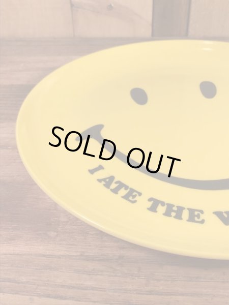 スマイルのプラスチック製の70年代ビンテージお皿