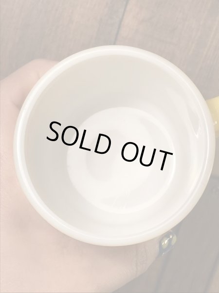 スマイルフェイスとHave A Happy Dayが描かれた70’sヴィンテージヘーゼルアトラスマグ